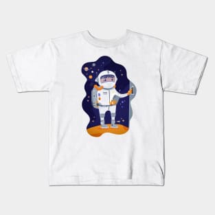 Cosmonaut in space on planet Kids T-Shirt